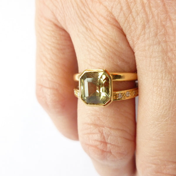 Modern double‑band gold ring with pavé set diamonds