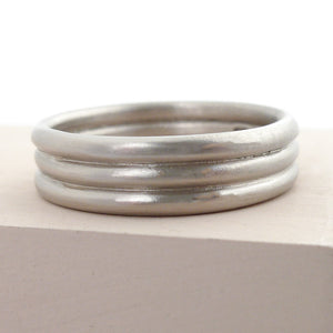 Contemporary modern wedding ring for men or women 18ct white gold
