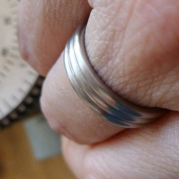 Contemporary modern wedding ring for men or women 18ct white gold