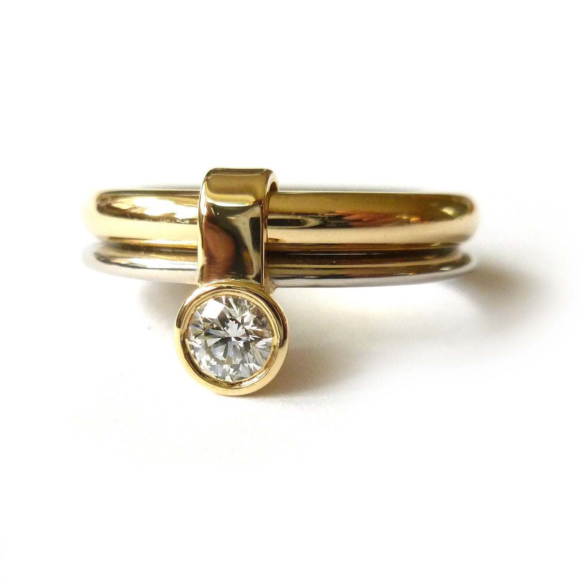 Contemporary, unique, bespoke, modern and handmade engagement ring gold