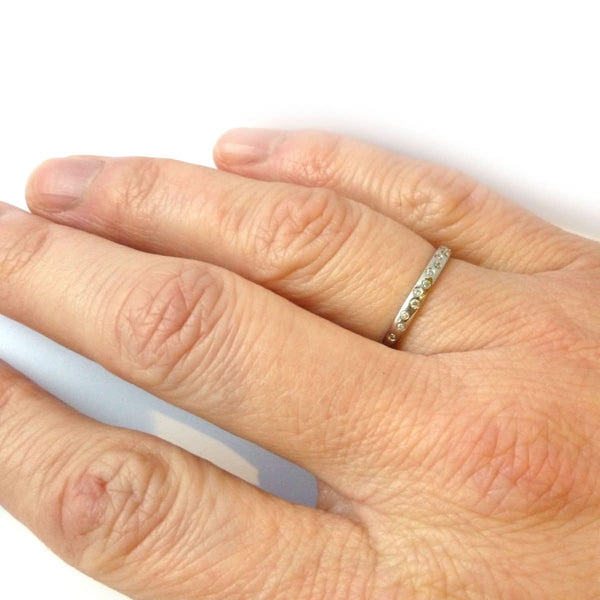 Contemporary, unique, bespoke and modern platinum diamond wedding ring, engagement ring, eternity ring, matt brushed finish. Handmade by designer maker Sue Lane
