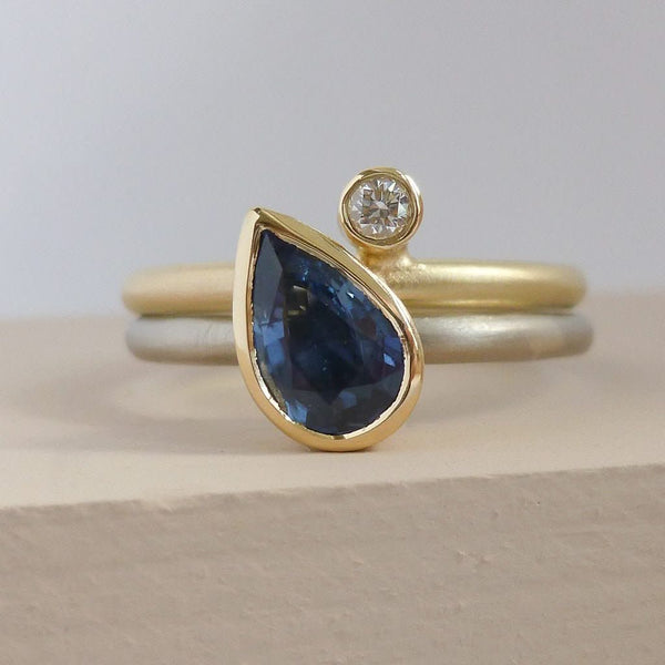 Modern cornflower blue ethically sourced sapphire and diamond stacking ring set by Sue Lane. Multi band ring or interlocking ring, sometimes called double band ring too.