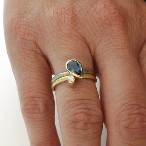 Modern cornflower blue ethically sourced sapphire and diamond stacking ring set by Sue Lane. Multi band ring or interlocking ring, sometimes called double band ring too.