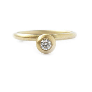 Modern, bespoke and unique 18k gold and round diamond contemporary matt brushed stacking engagement ring by designer maker Sue Lane, UK