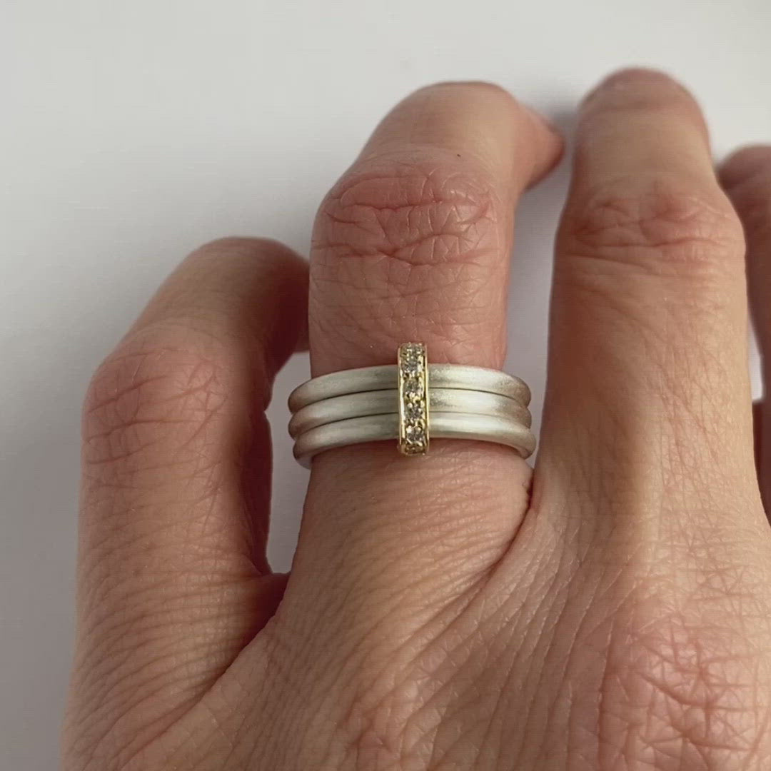 Contemporary silver 18ct gold stacking ring set handmade and bespoke
