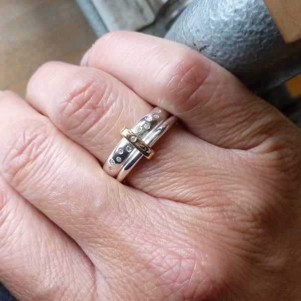 Modern unique and bespoke contemporary silver gold and diamond eternity style two band stacking ring by Sue Lane