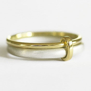 Unusual, unique, bespoke and modern women's/men’s wedding ring in silver and gold. Handmade by Sue Lane Jewellery in Herefordshire, UK. Unique wedding ring.