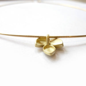 modern and simple yellow gold leaf inspired necklace handmade by Sue Lane UK