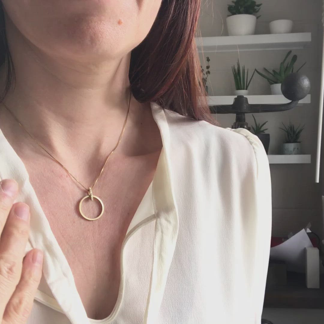 Contemporary jewellery, gold and diamond bespoke handmade necklace pendant.