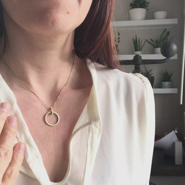 Contemporary jewellery, gold and diamond bespoke handmade necklace pendant.