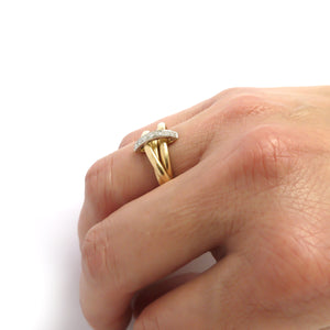 A unique contemporary unique two tone gold and diamond Russian style linked ring