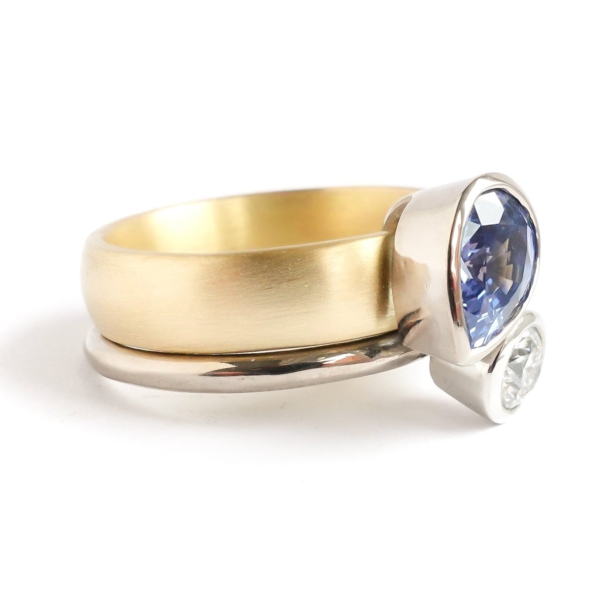 Contemporary, modern and bespoke silver, blue sapphire and diamond handmade stacking ring, by jewellery designer Sue Lane.