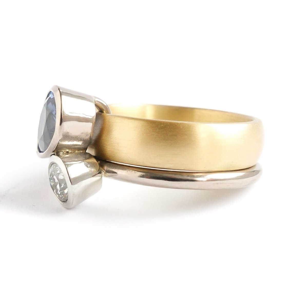 Contemporary, modern and bespoke silver, blue sapphire and diamond handmade stacking ring, by jewellery designer Sue Lane.
