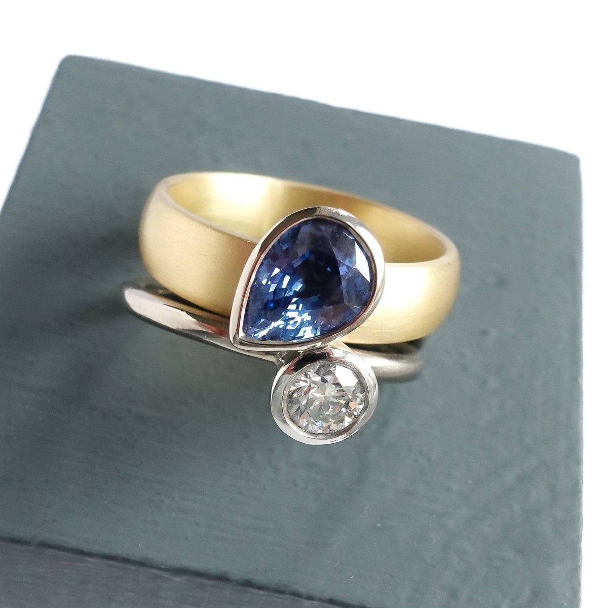 Contemporary, modern and bespoke silver, blue sapphire and diamond handmade stacking ring, by jewellery designer Sue Lane.