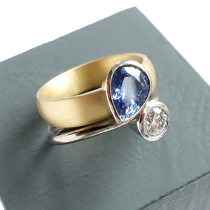 Contemporary, modern and bespoke silver, blue sapphire and diamond handmade stacking ring, by jewellery designer Sue Lane.
