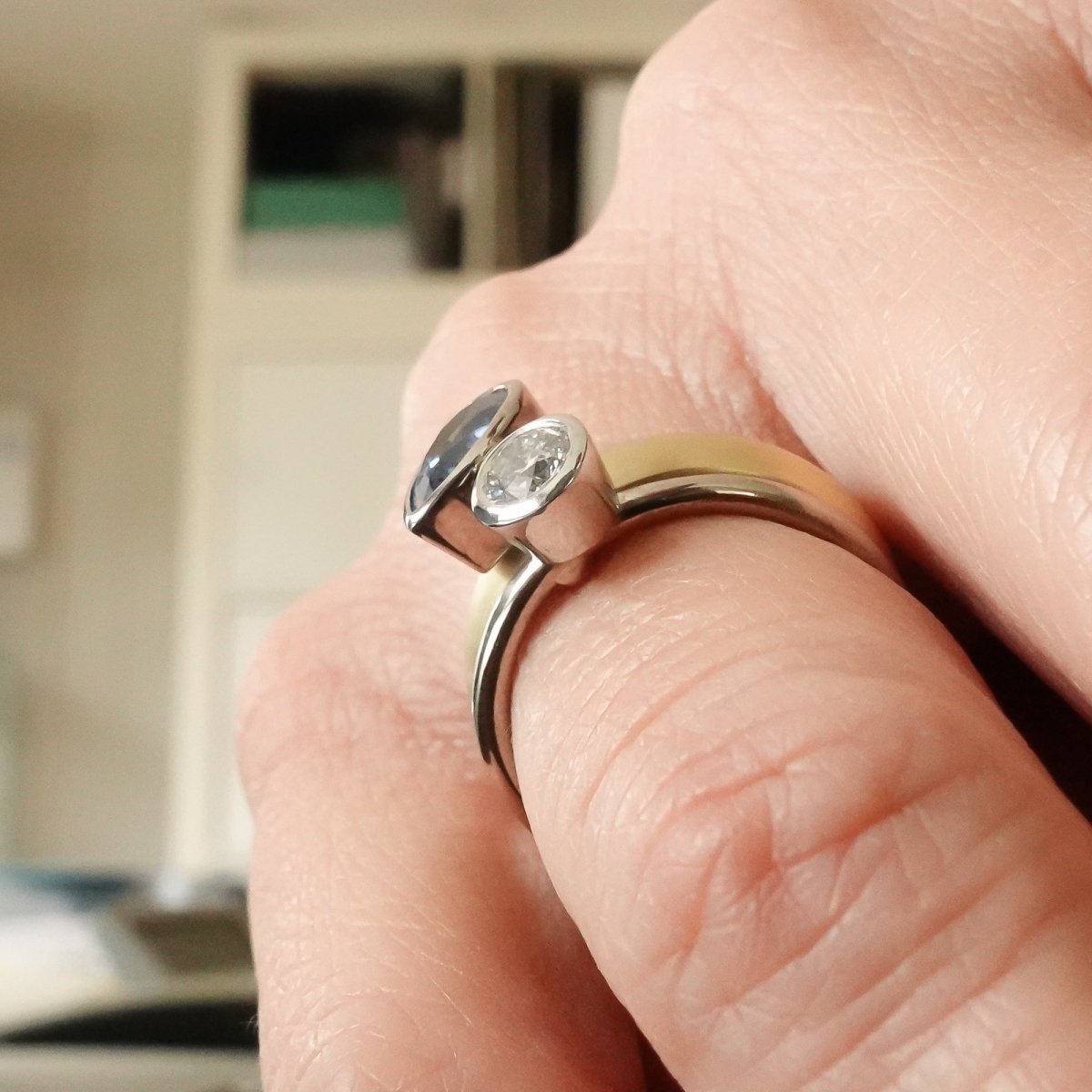 Contemporary, modern and bespoke silver, blue sapphire and diamond handmade stacking ring, by jewellery designer Sue Lane.