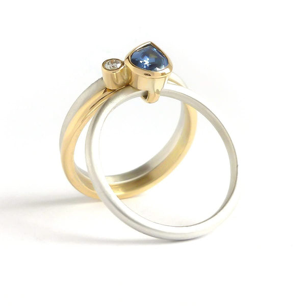 A contemporary bespoke unique aquamarine and diamond gold and silver ring by Sue Lane