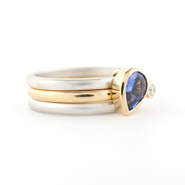 A contemporary bespoke unique aquamarine and diamond gold and silver ring by Sue Lane
