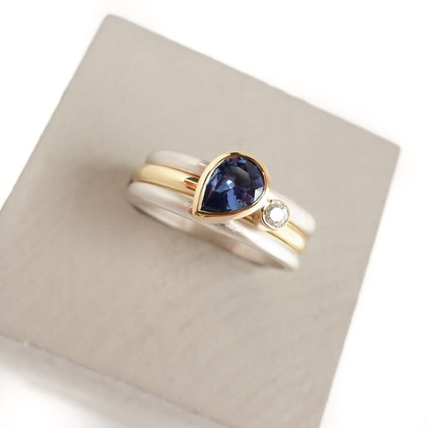 A contemporary bespoke unique aquamarine and diamond gold and silver ring by Sue Lane
