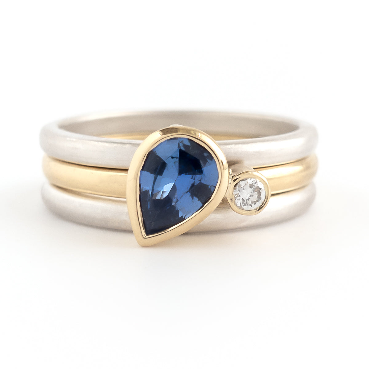 A contemporary bespoke unique aquamarine and diamond gold and silver ring by Sue Lane