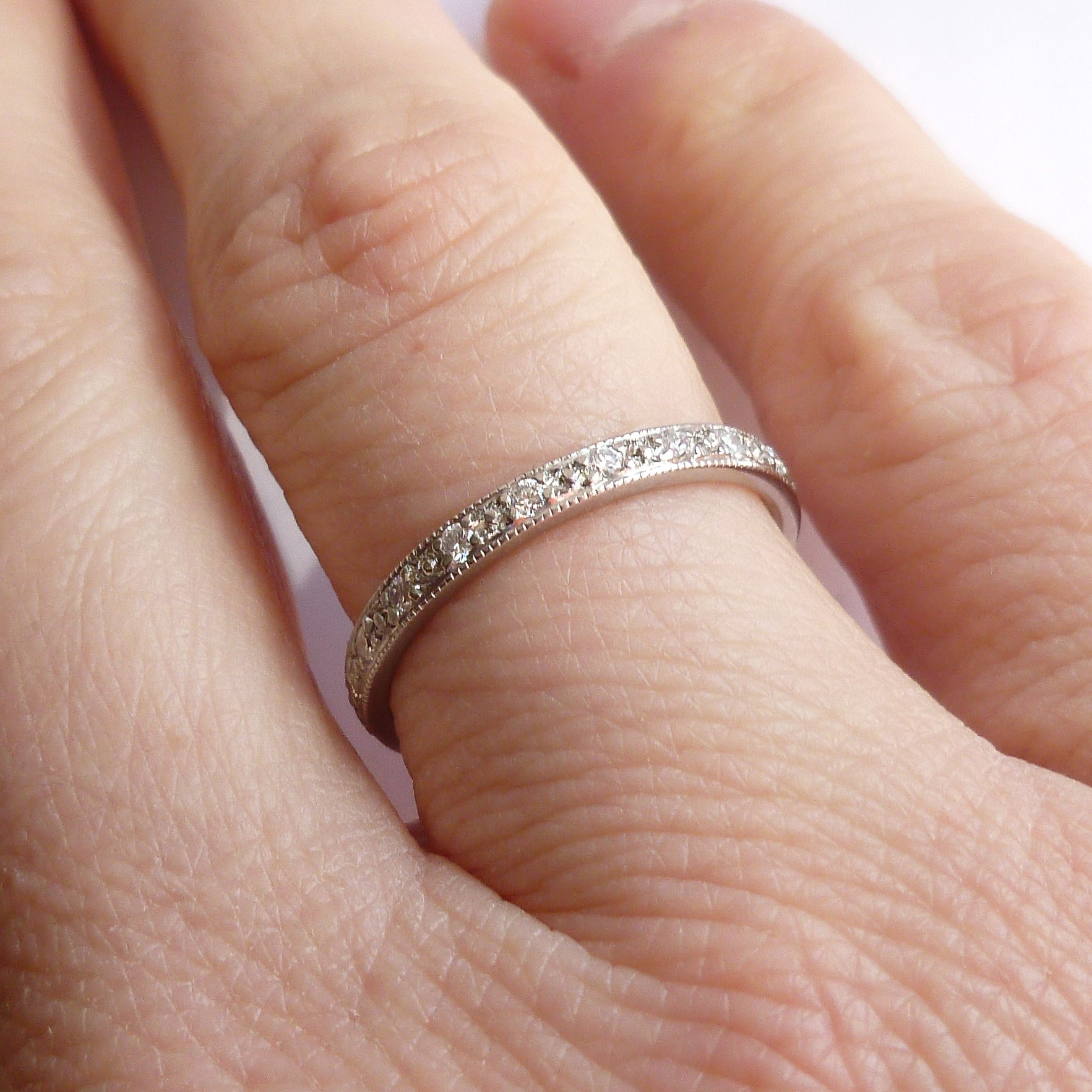 A beautiful classic platinum and diamond wedding or eternity ring handmade by Sue 