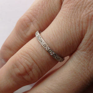 A beautiful classic platinum and diamond wedding or eternity ring handmade by Sue 