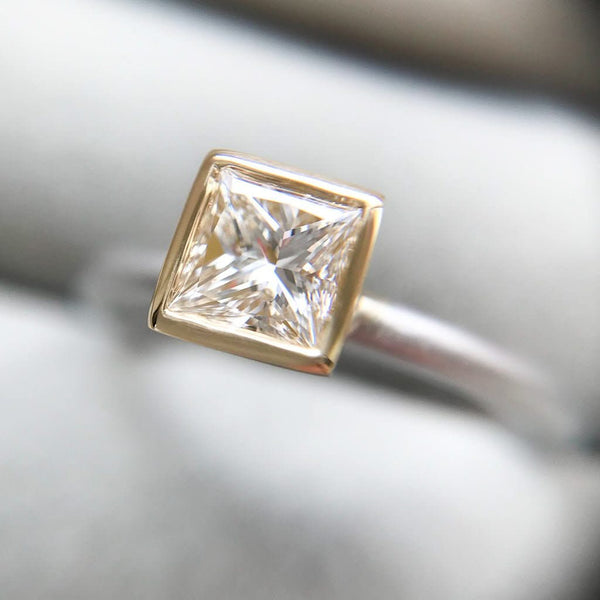 A beautiful, contemporary platinum and 18ct yellow engagement ring.