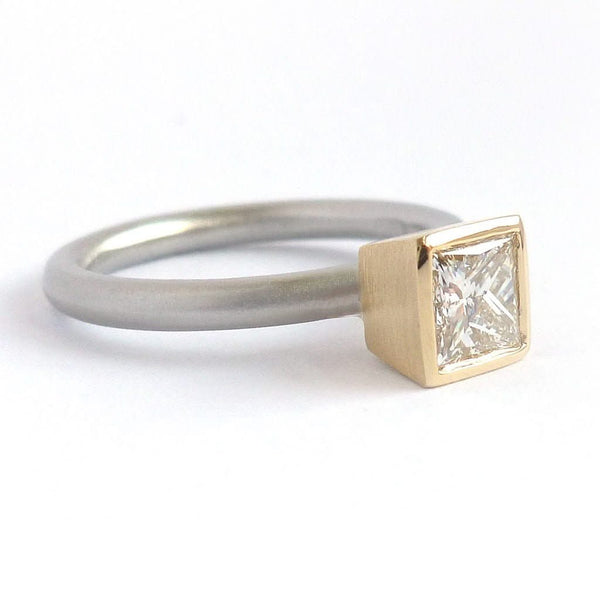 A beautiful, contemporary platinum and 18ct yellow engagement ring.