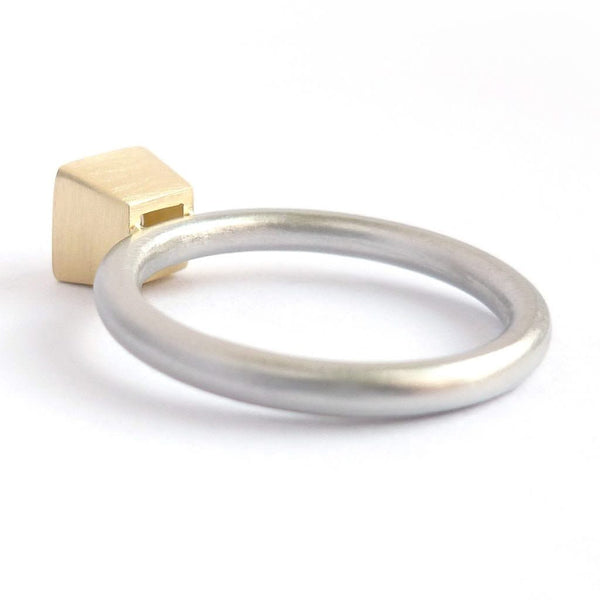 A beautiful, contemporary platinum and 18ct yellow engagement ring.
