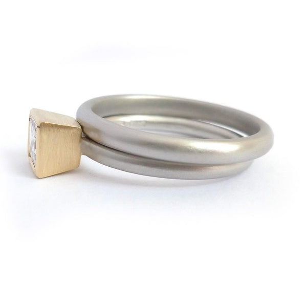 A beautiful, contemporary platinum and 18ct yellow engagement ring.