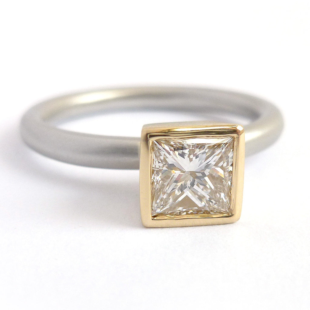 A beautiful, contemporary platinum and 18ct yellow engagement ring.