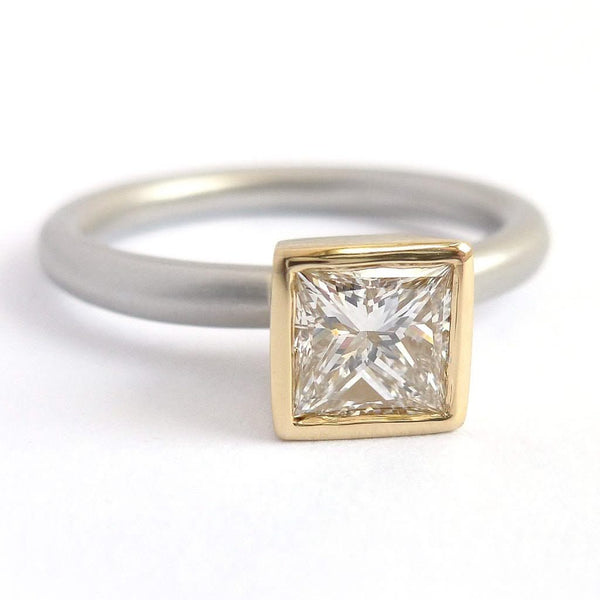 A beautiful, contemporary platinum and 18ct yellow engagement ring.