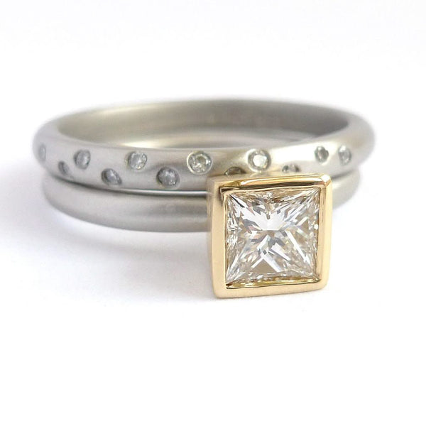 A beautiful, contemporary platinum and 18ct yellow engagement ring.