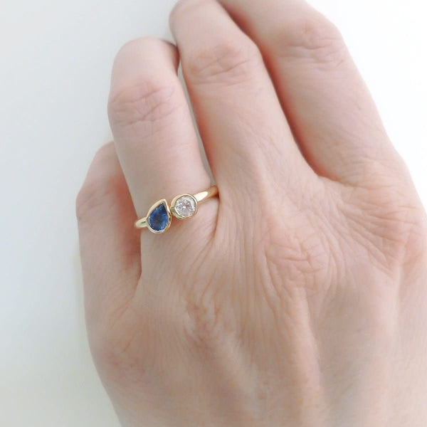 Bespoke pear shape blue sapphire and diamond ring by Sue Lane
