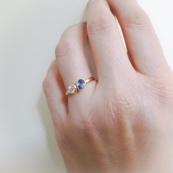 Bespoke pear shape blue sapphire and diamond ring by Sue Lane