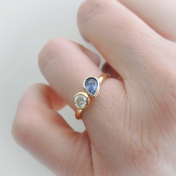 Bespoke pear shape blue sapphire and diamond ring by Sue Lane
