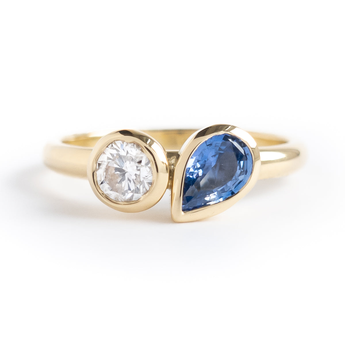 Bespoke pear shape blue sapphire and diamond ring by Sue Lane