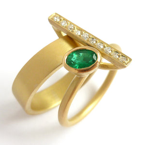 One off contemporary ring with lovely emerald and pave set diamonds. Totally bespoke and unique.