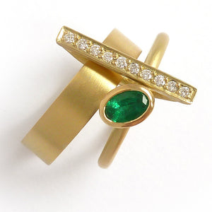 One off contemporary ring with lovely emerald and pave set diamonds. Totally bespoke and unique.