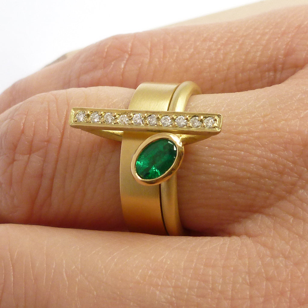 One off contemporary ring with lovely emerald and pave set diamonds. Totally bespoke and unique.