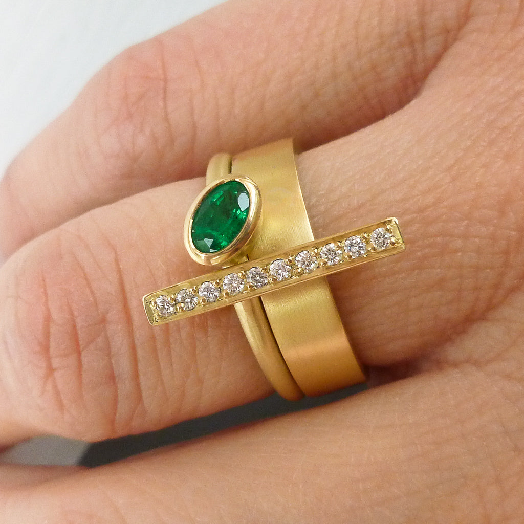 One off contemporary ring with lovely emerald and pave set diamonds. Totally bespoke and unique.