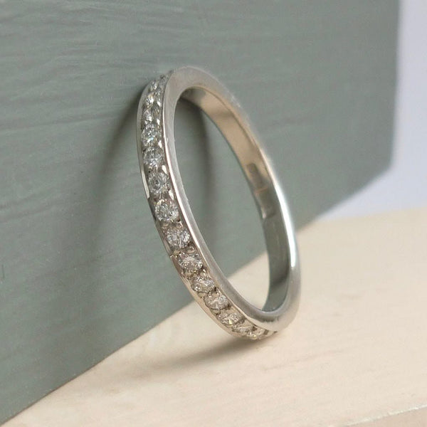 Classic platinum and diamond wedding or eternity ring 
