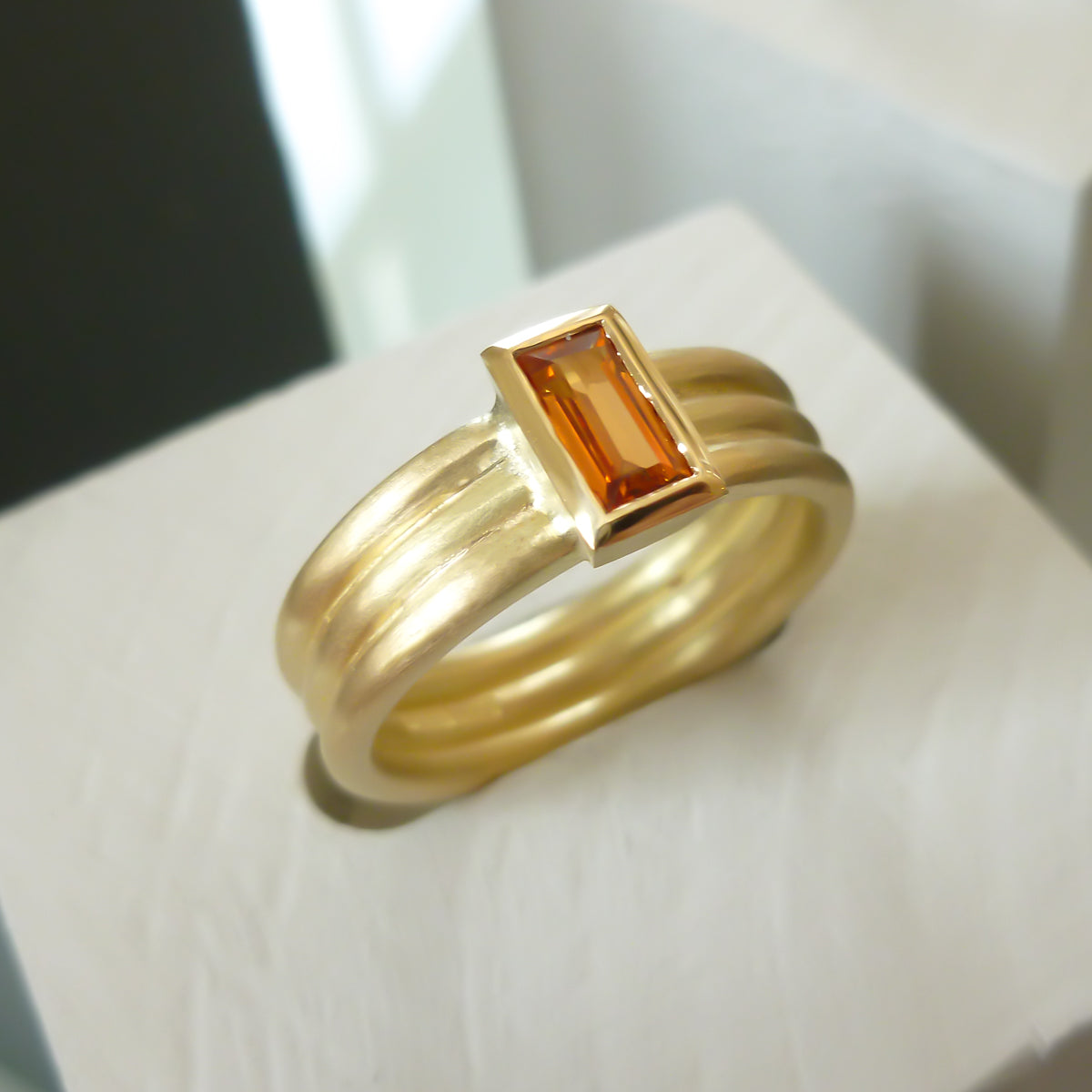 Contemporary 18ct gold ring with orange sapphire - handmade, designer, bespoke, custom Sue Lane.