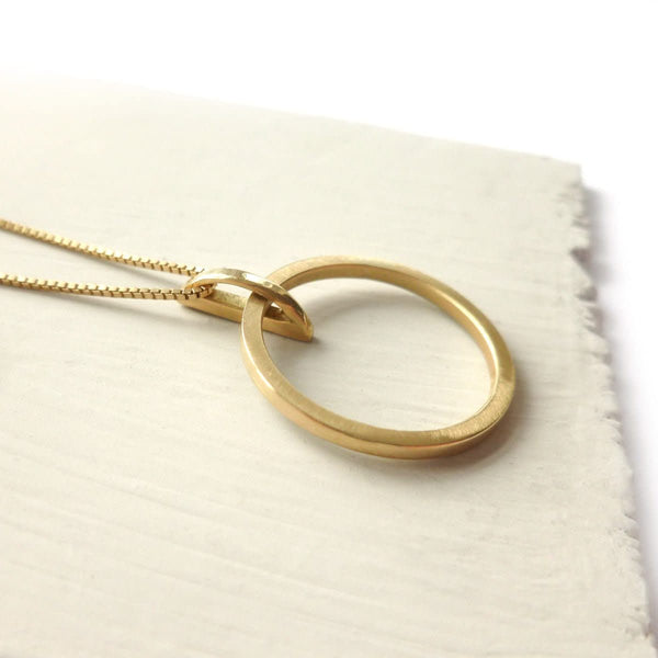 Contemporary jewellery, gold and diamond bespoke handmade necklace pendant.