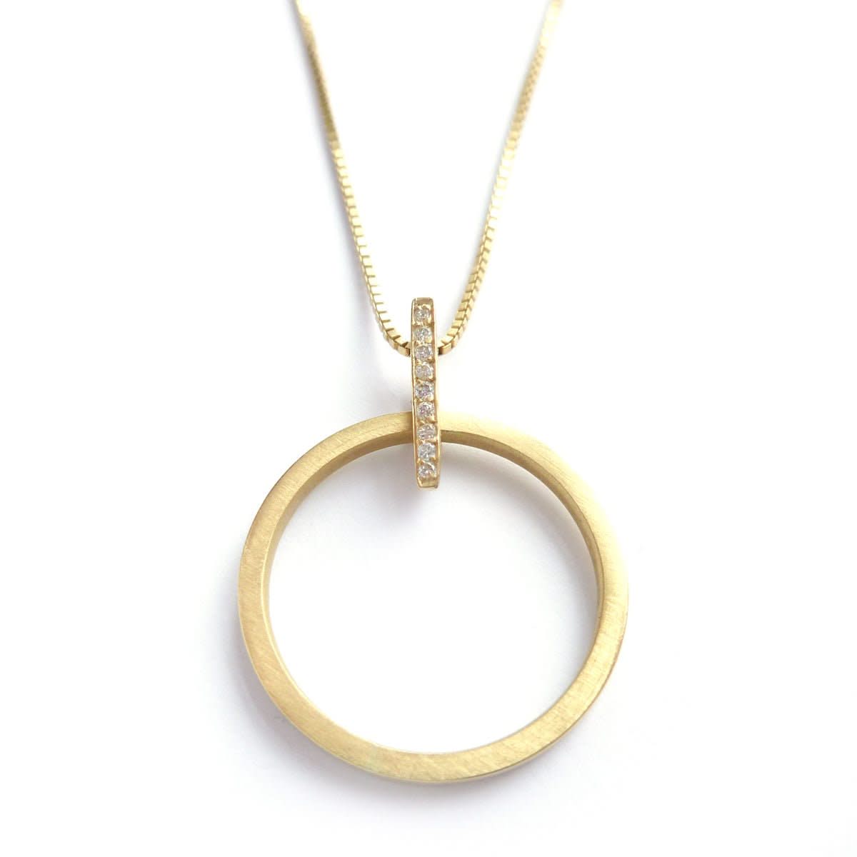 Contemporary jewellery, gold and diamond bespoke handmade necklace pendant.