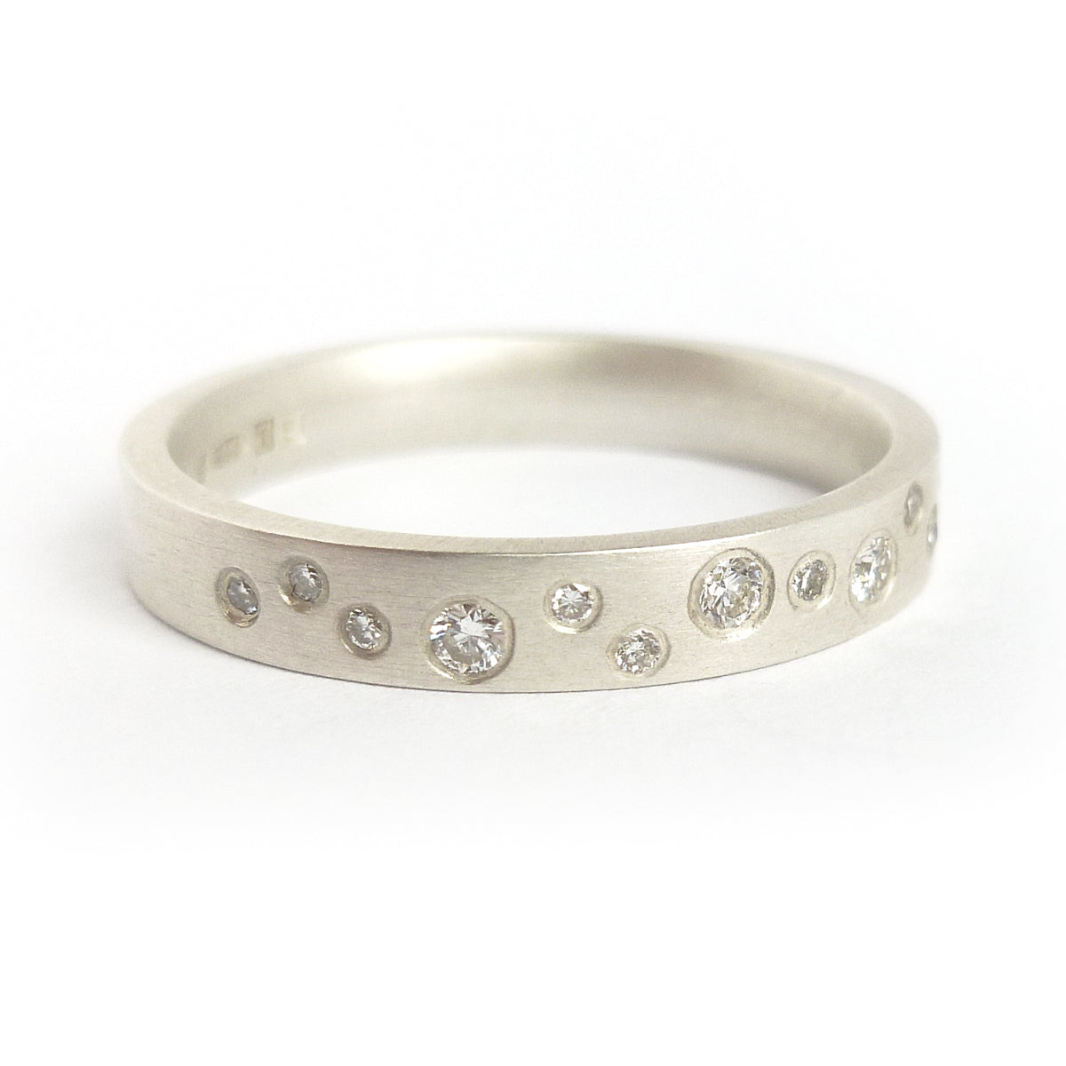 Contemporary jewellery, handmade, modern, bespoke silver eternity ring by Sue Lane