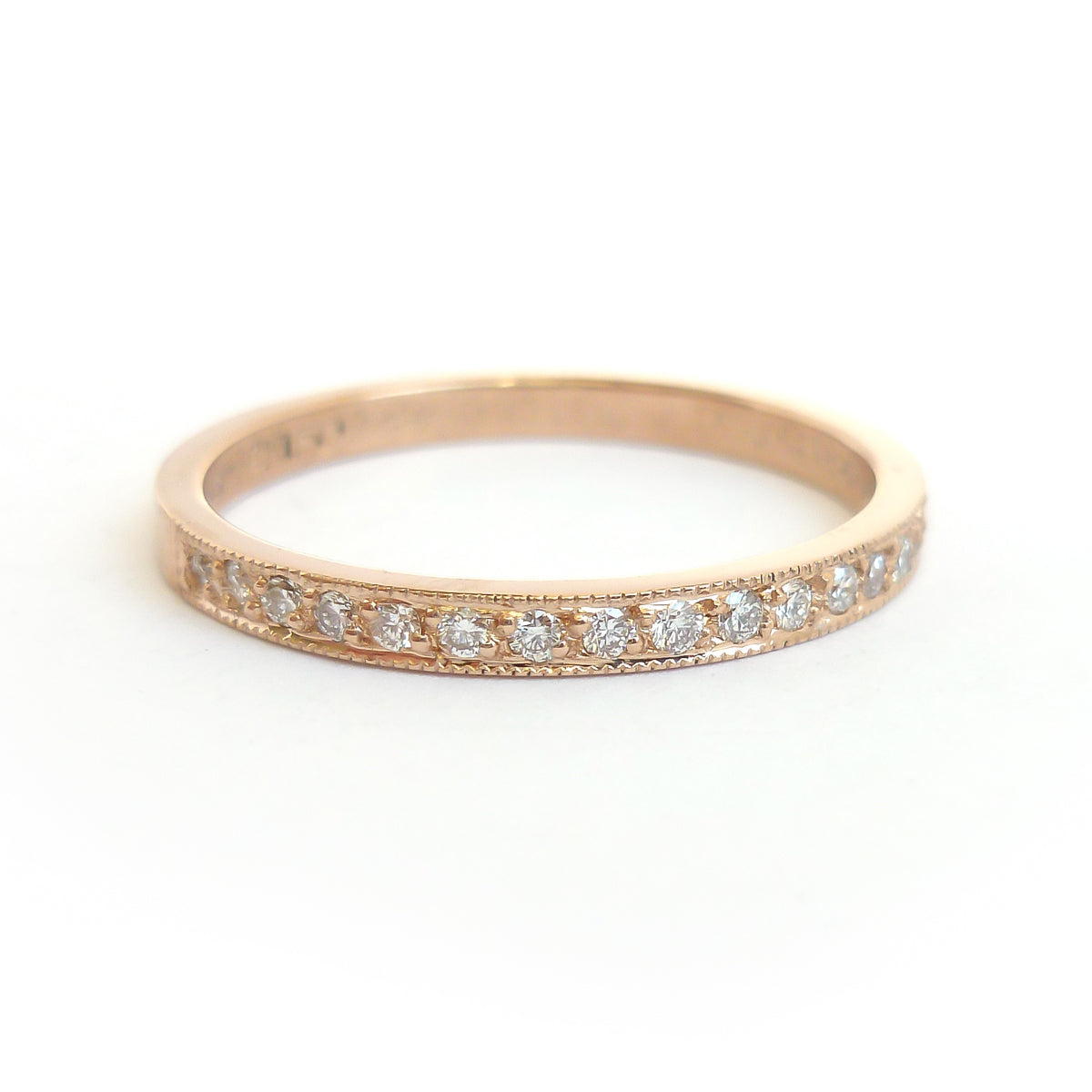 Contemporary rose gold and pear shaped imperial topaz stacking interlocking ring set.