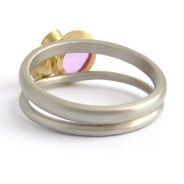 Platinum, 18ct gold, pink sapphire and two white diamonds ring. Contemporary, modern and unique.