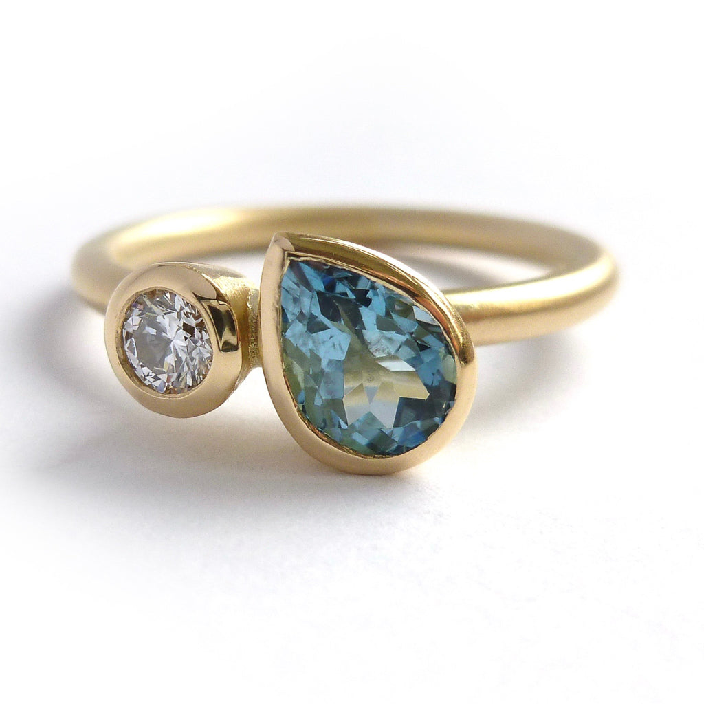 Contemporary, unique and modern aquamarine and diamond 18ct gold ring