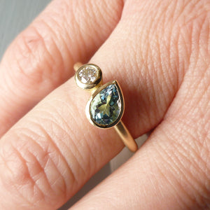 Contemporary, unique and modern aquamarine and diamond 18ct gold ring